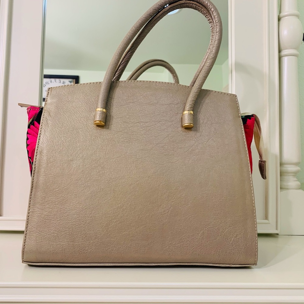 New Tote Purse. Embroidered. Tan color. 
Real leather